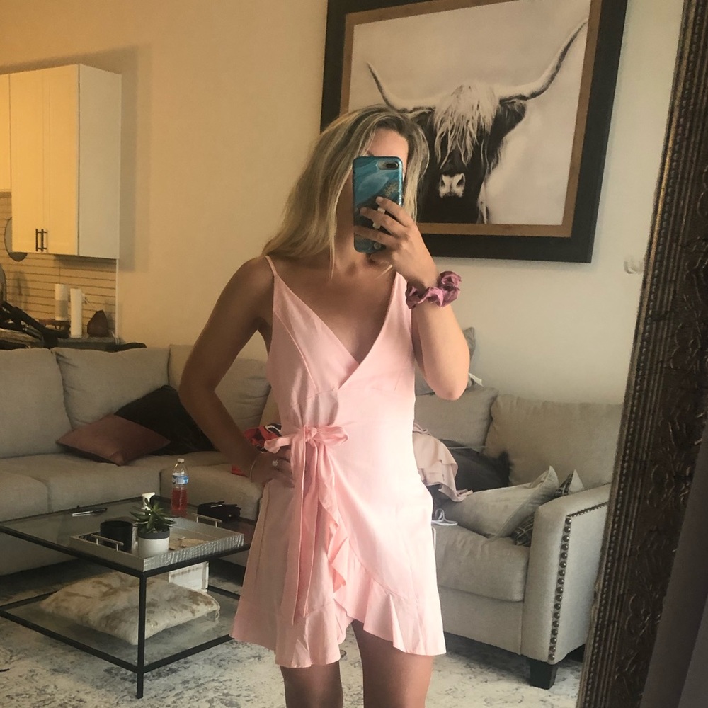 Pink wrap/ tie ruffle dress